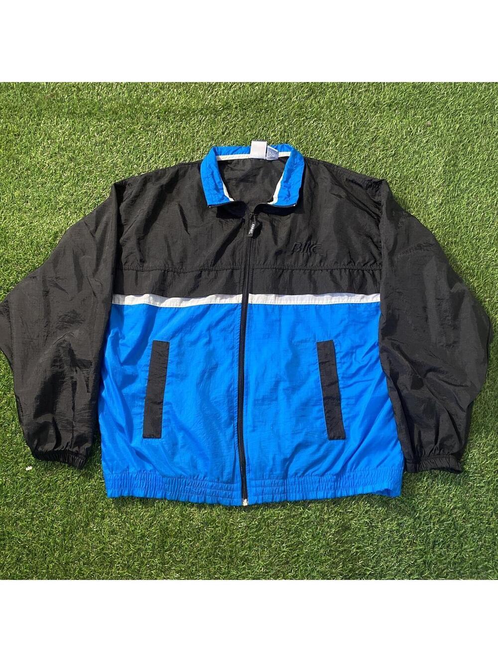 Vintage 90’s BIKE blue and black windbreaker jacket with white stripe